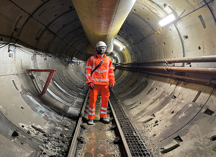 Student in a tunnel in high-vis