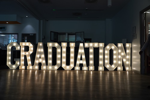 light up letters spelling, Graduation